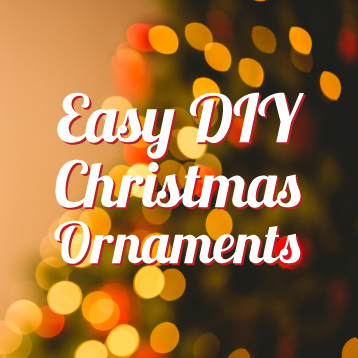 Blurred Christmas tree lights in the background with the text "Easy DIY Christmas Ornaments" in large white and red font in the foreground.