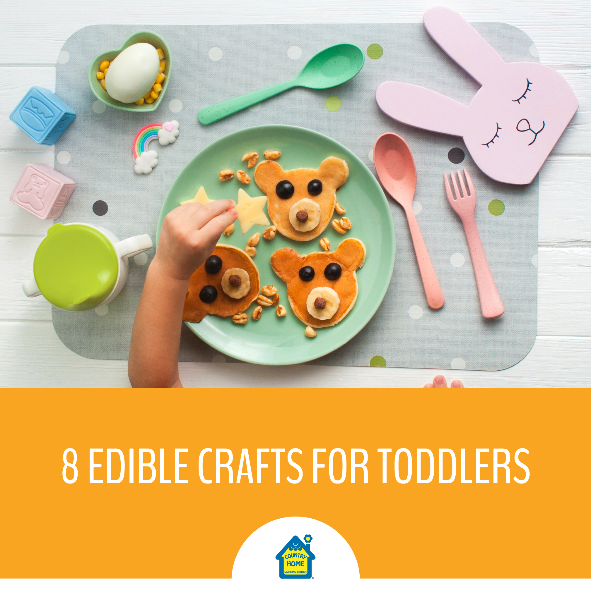 A child decorates bear-shaped pancakes on a green plate with a pastel-colored bunny placemat and utensils, surrounded by toddler-friendly items. Text reads: "8 Edible Crafts for Toddlers.
