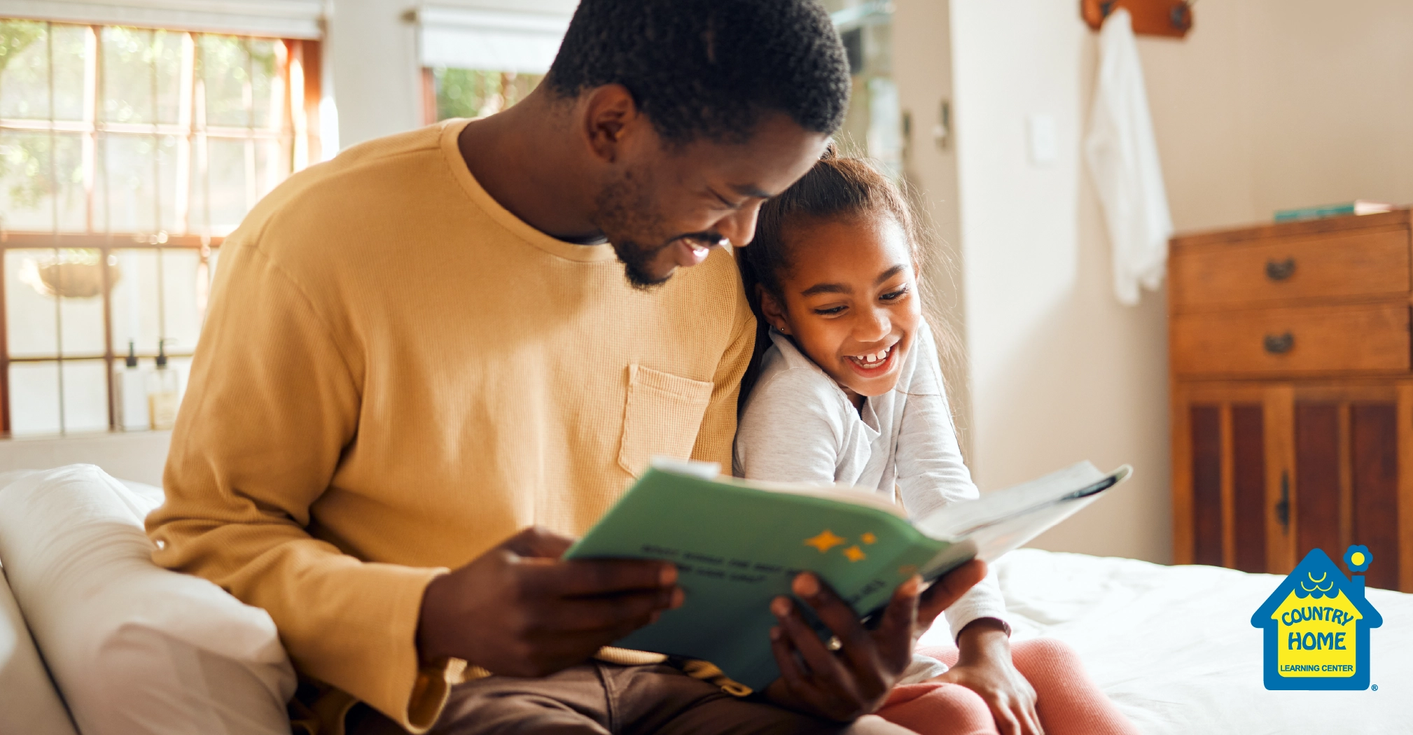 father reading to his daughter