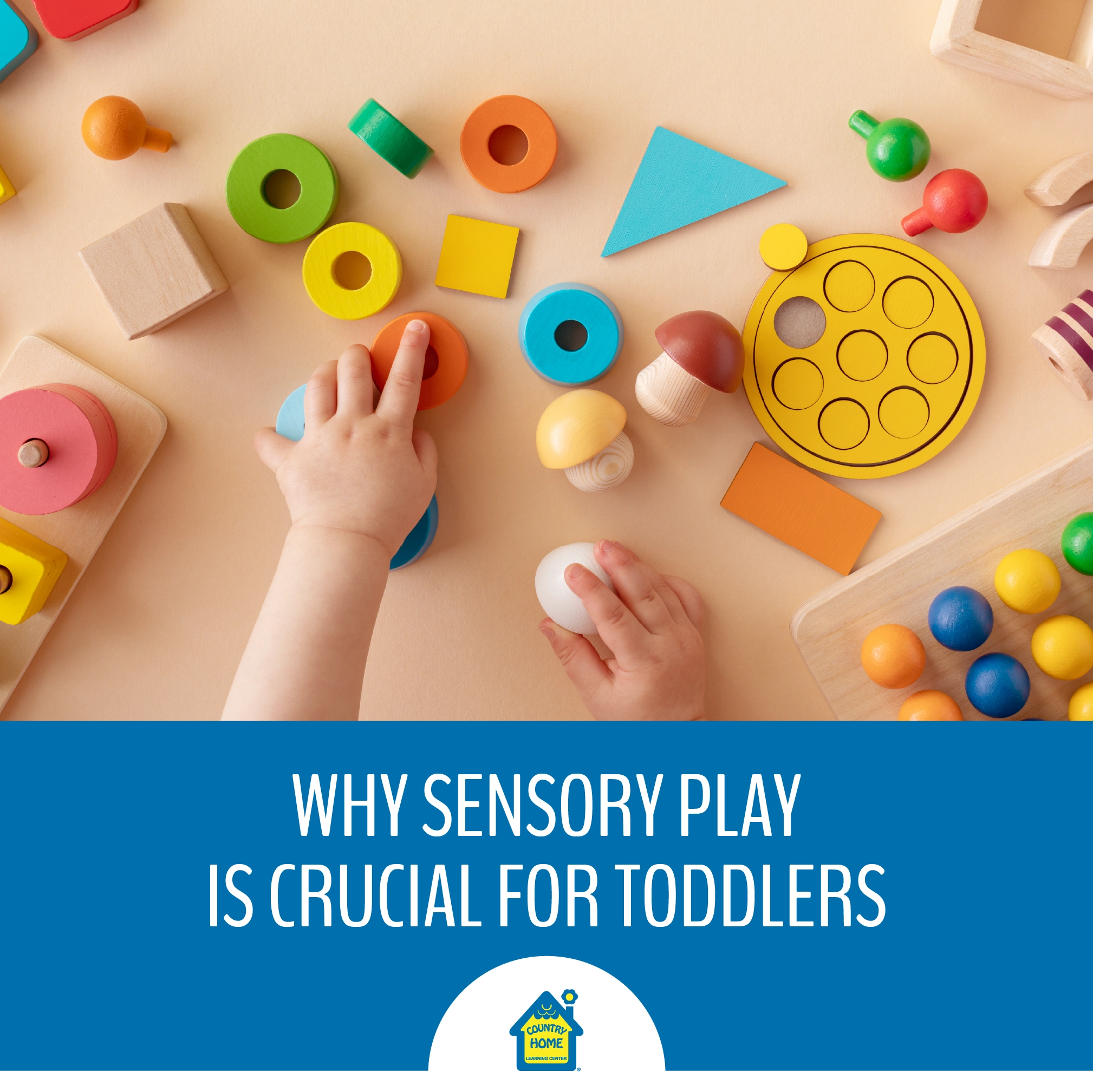 Toddler hands with colorful wooden toys on table from above