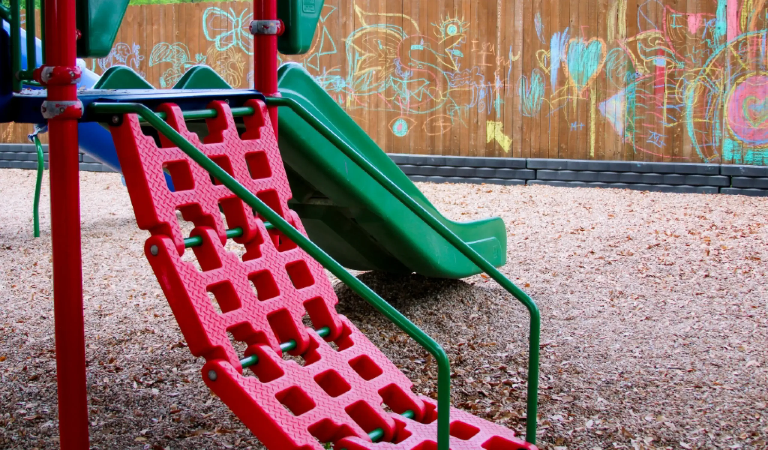a red climbing ladder at Country Home Learning Center Southwest Austin location serving families from the 78739 and 78749 zip codes