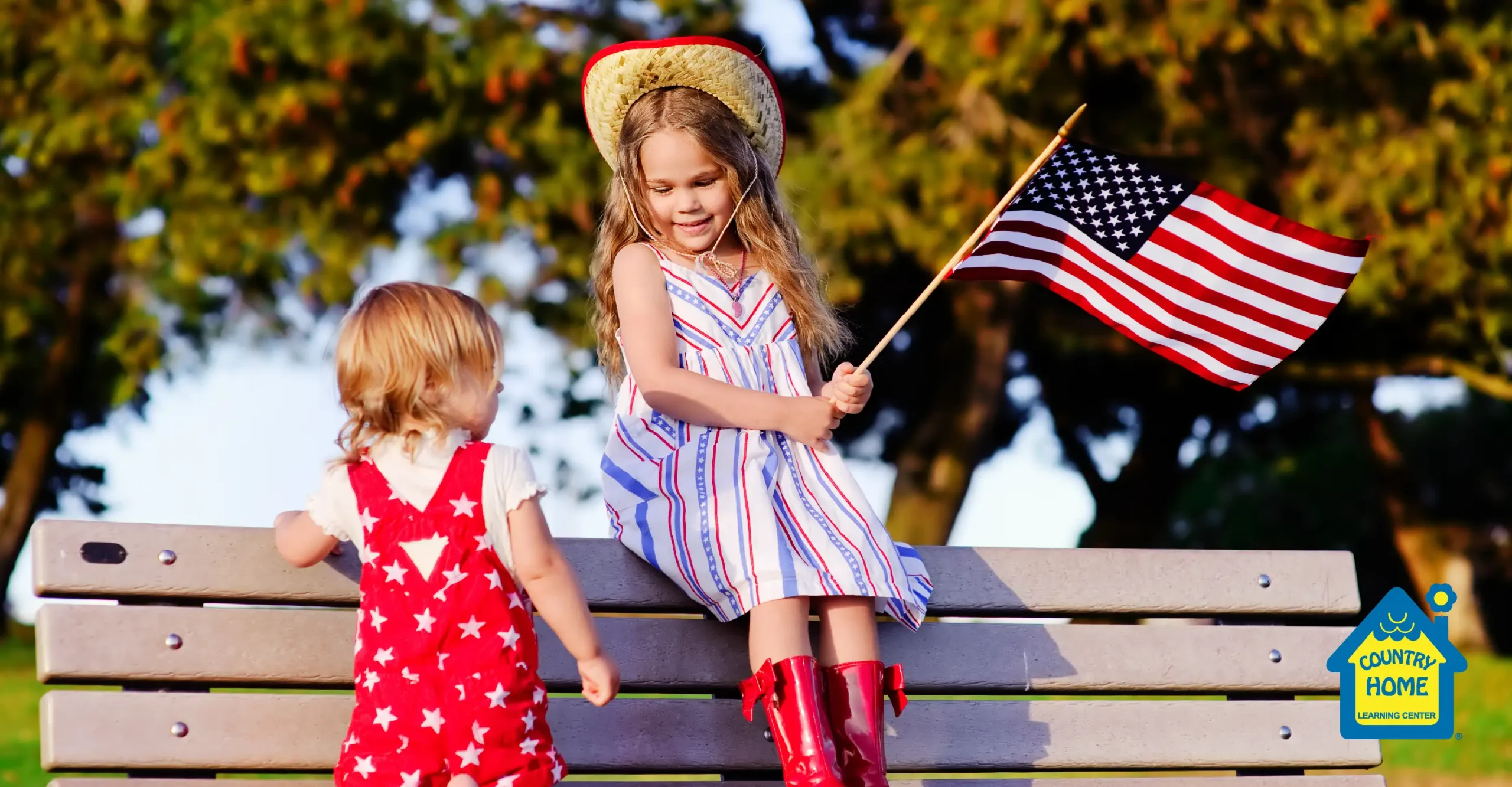 Two kids celebrating the Fourth of July.