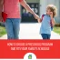 A dad walking his child into school.